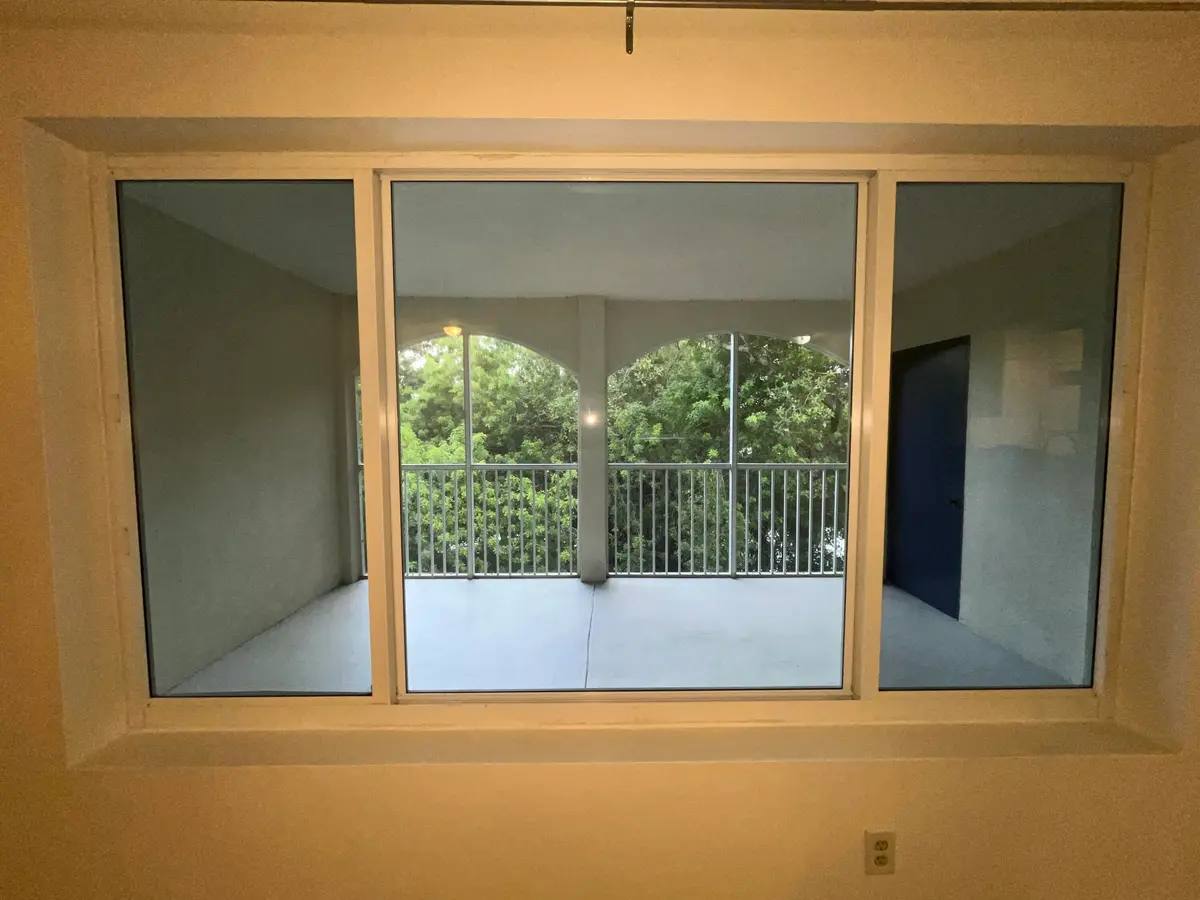 Picture window with view of patio at 815 W BOYNTON BEACH Boulevard 11-203, Boynton Beach