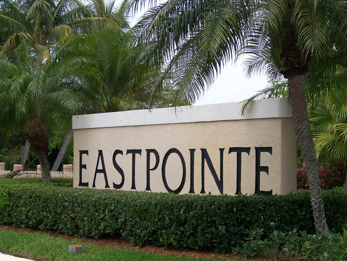 Entrance to Eastpointe Golf Community at 13335 TOUCHSTONE Place 103, Palm Beach Gardens