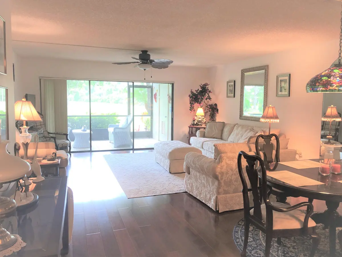 Dining/Living Room, Porch at 13335 TOUCHSTONE Place 103, Palm Beach Gardens