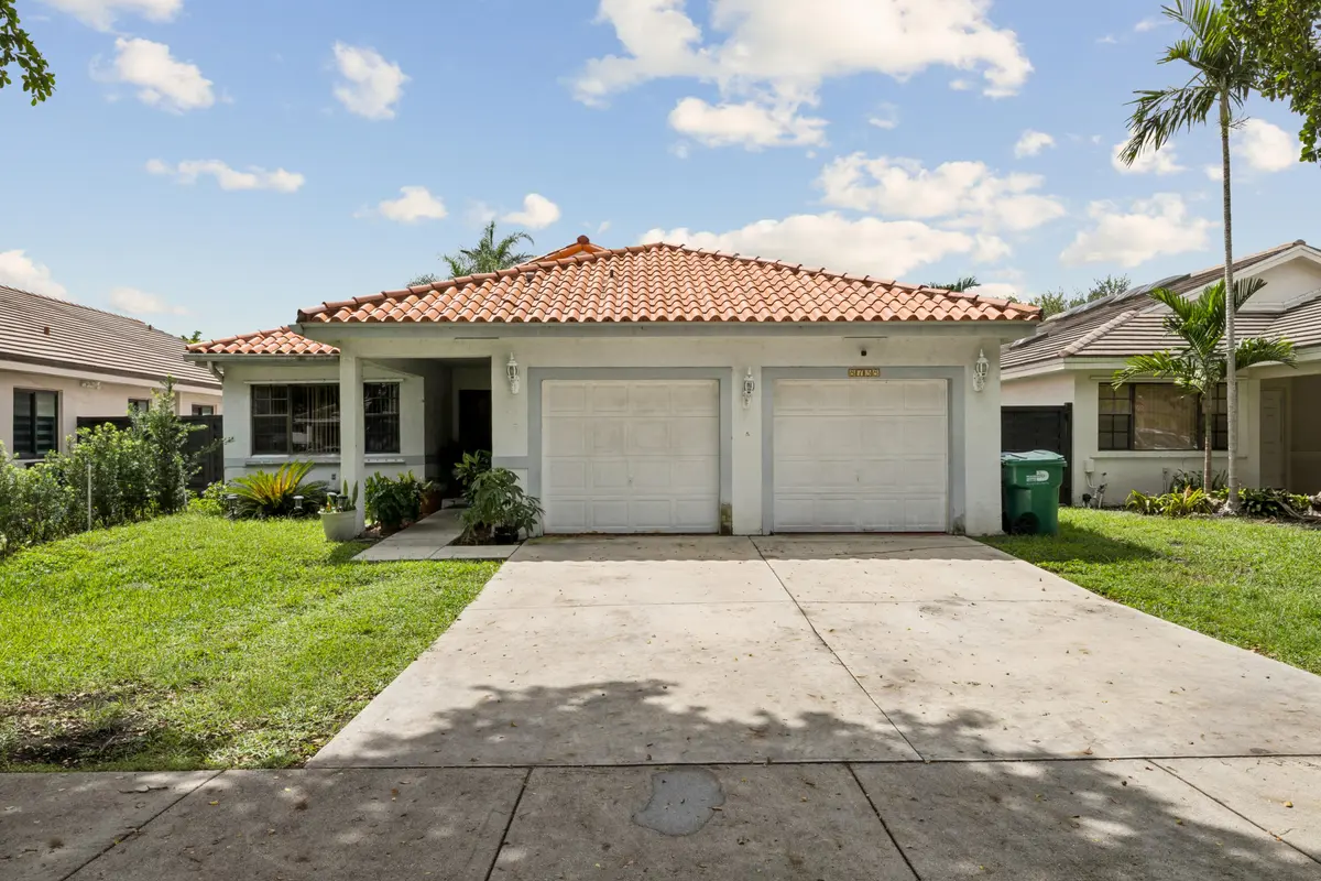 front at 8738 NW 150th Terrace, Miami Lakes