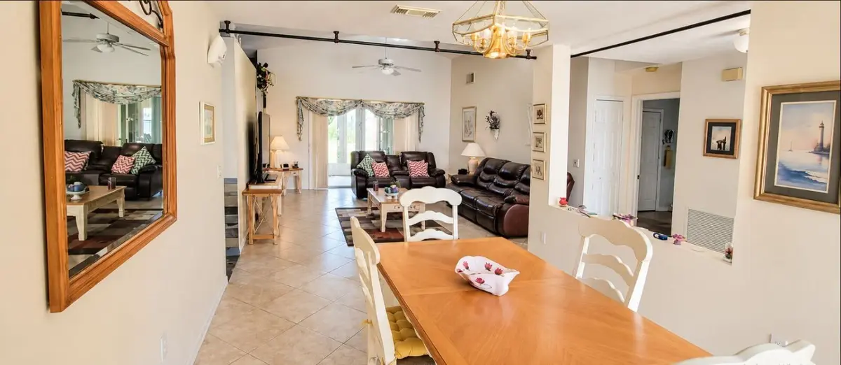 Dining & Living Area at 6747 PICANTE Circle, Fort Pierce