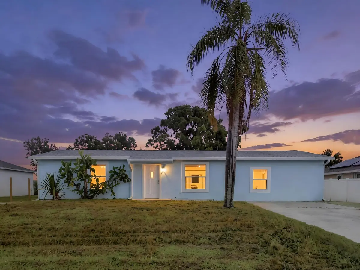 Front Dusk at 711 NW RIVERSIDE Drive, Port St. Lucie