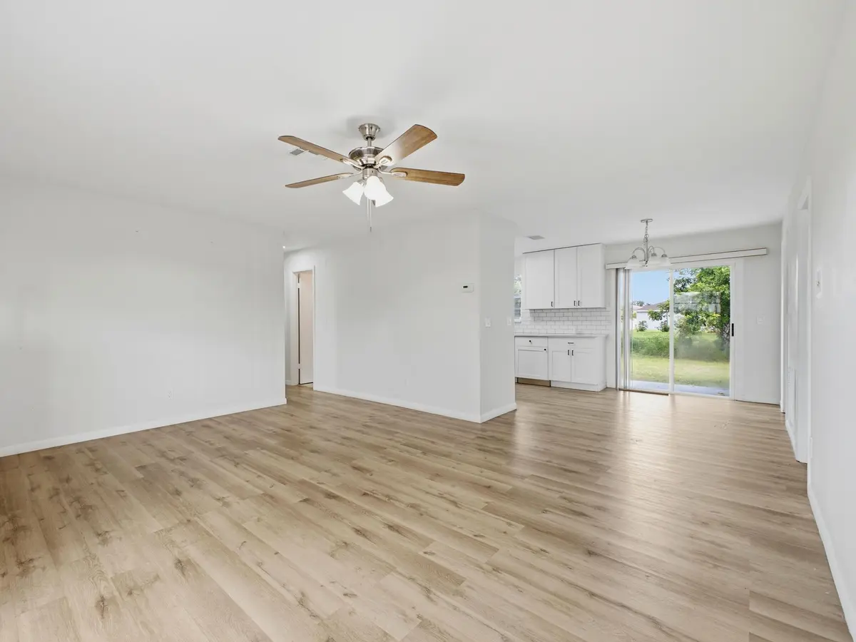 Living to Dining Kitchen at 711 NW RIVERSIDE Drive, Port St. Lucie
