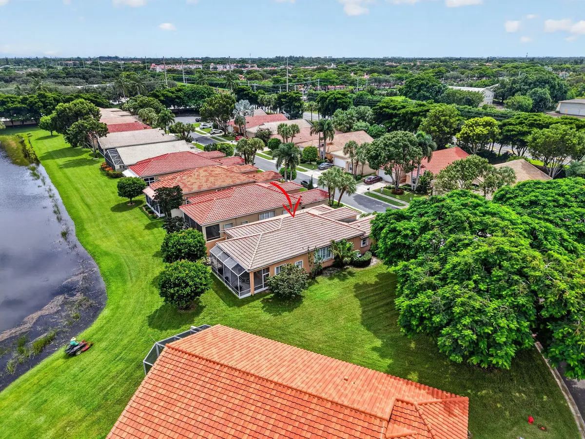 EXTRAORDINARY 1/4 acre Lake Lot at 6565 VIA TRENTO, Delray Beach