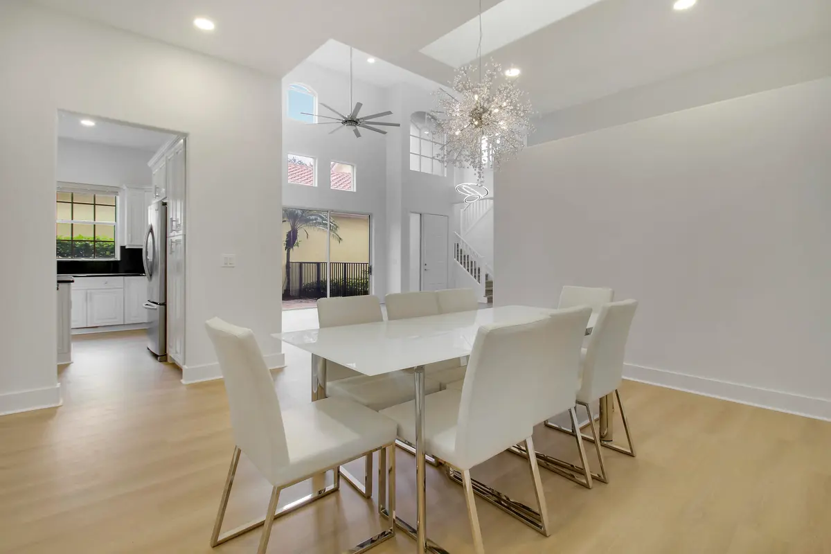 Dining to Family and Kitchen at 10375 OSPREY Trace, West Palm Beach
