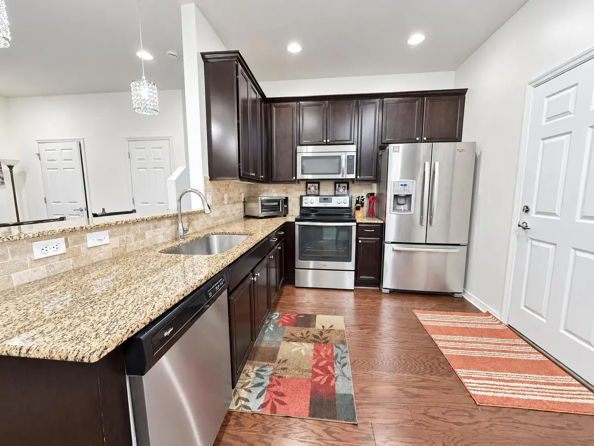 Kitchen at 118 BLACK IRONWOOD Road 105, Jupiter
