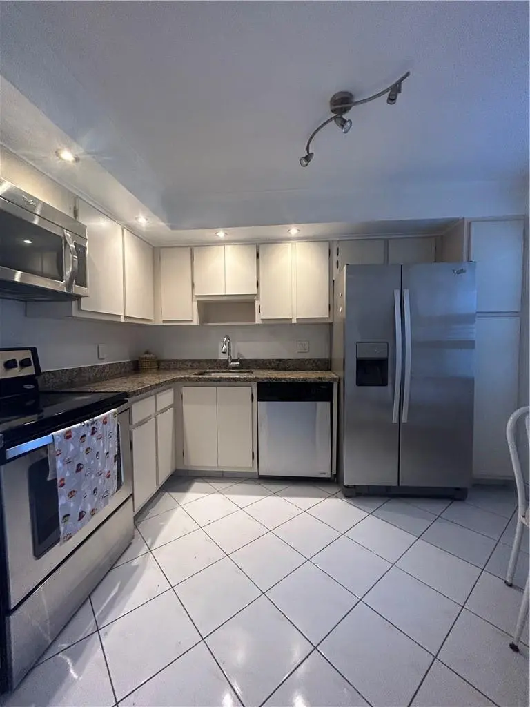 Photo 1 at 3970 OAKS CLUBHOUSE Drive 310, Pompano Beach