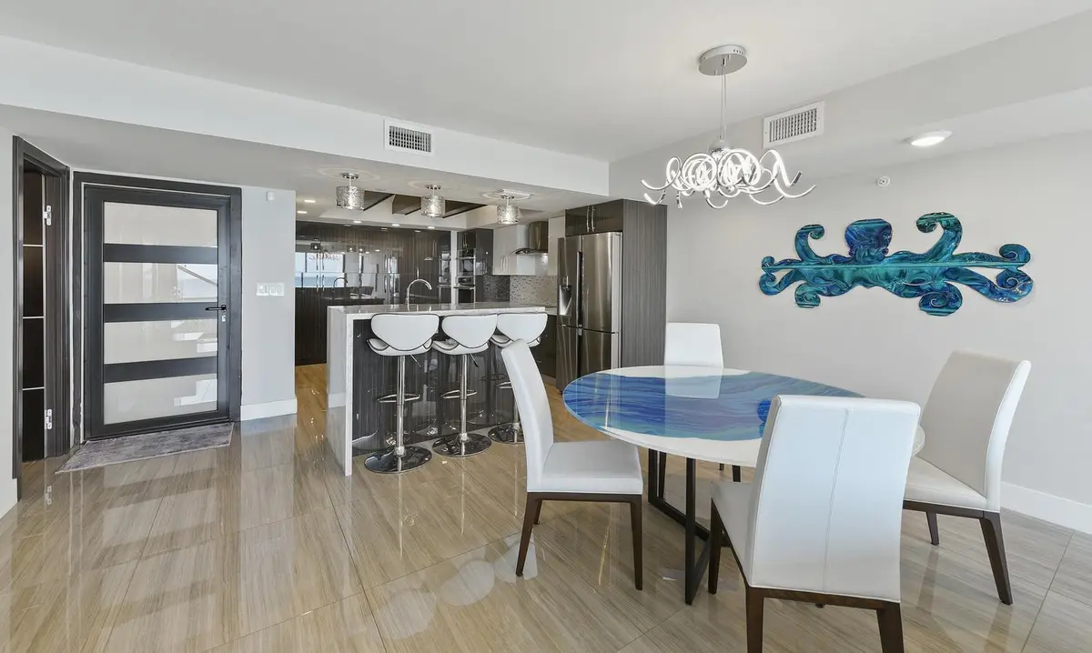 dining to kitchen at 3115 S OCEAN Boulevard 103, Highland Beach