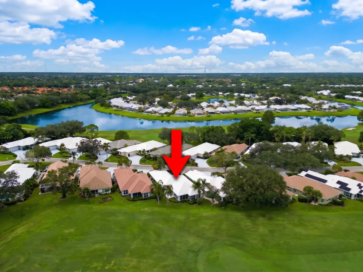 Aerial back of home_arrow-blue sky at 2479 SW Brookwood Lane, Palm City