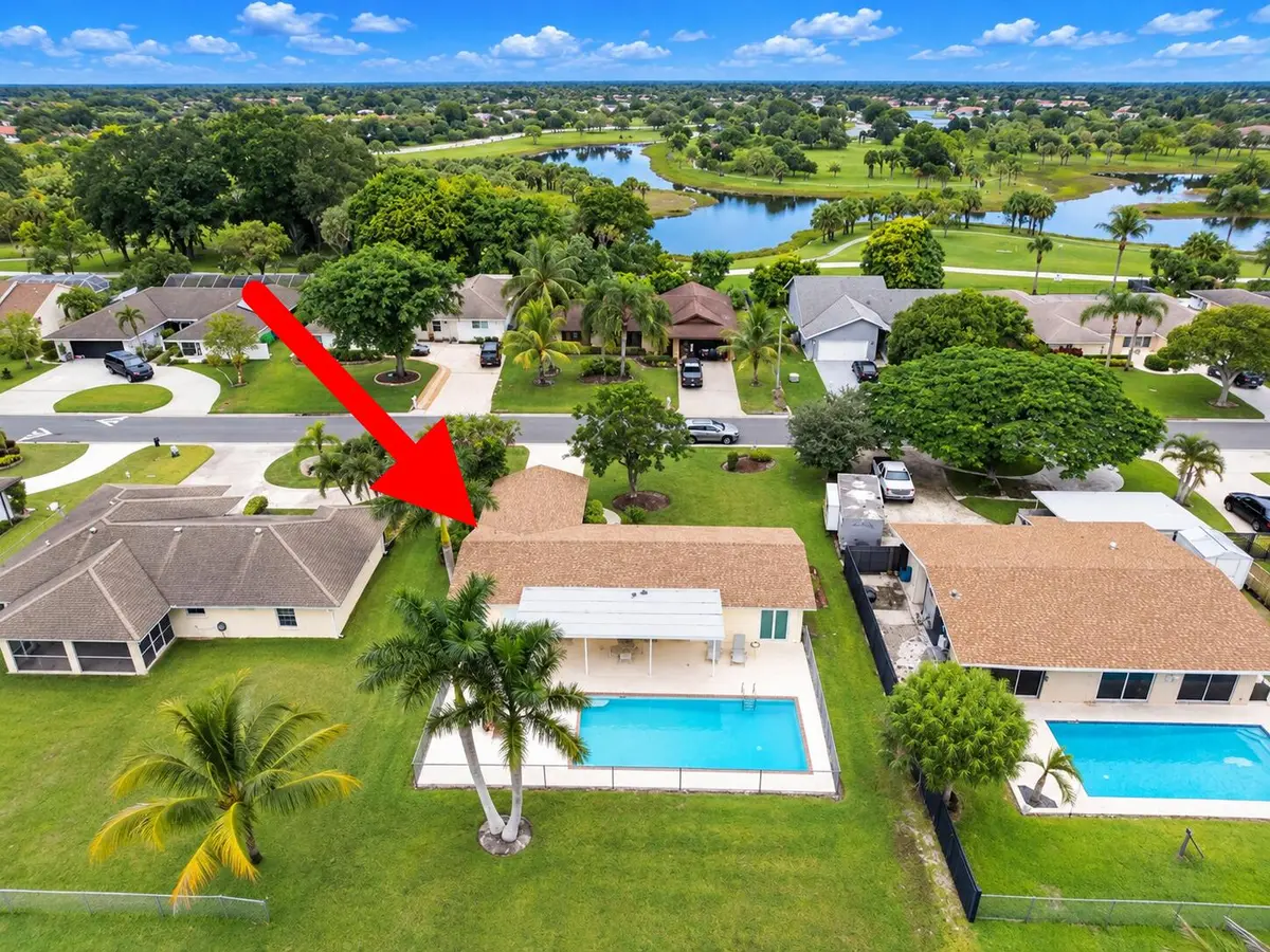A-arrow at 128 Sandpiper Avenue, Royal Palm Beach