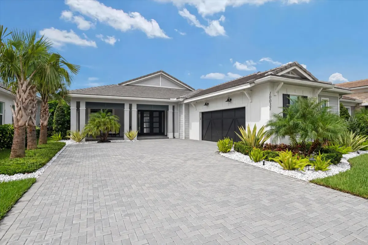 front photo at 10031 Timber Creek Way, Palm Beach Gardens