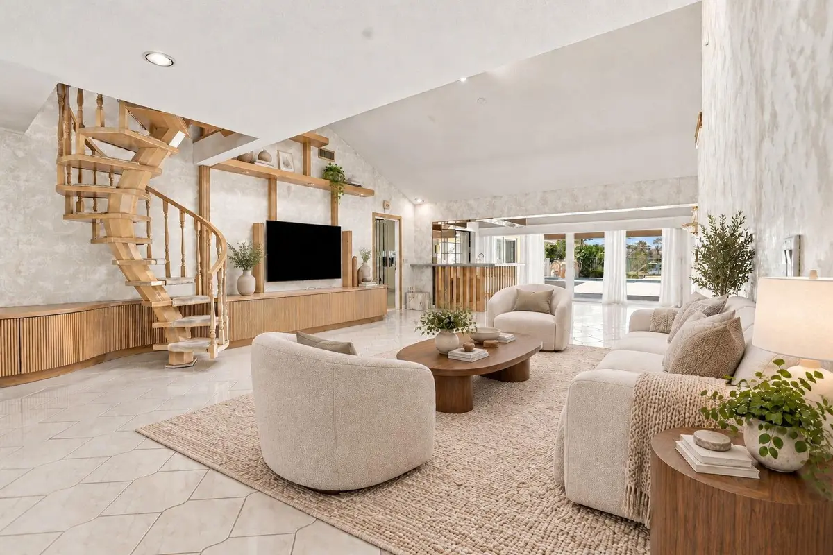 Virtually Staged Living Room at 352 River Edge Road, Jupiter
