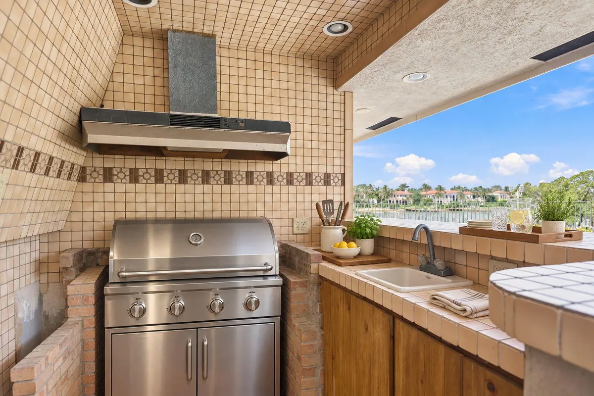 Virtually Staged Outdoor kitchen at 352 River Edge Road, Jupiter