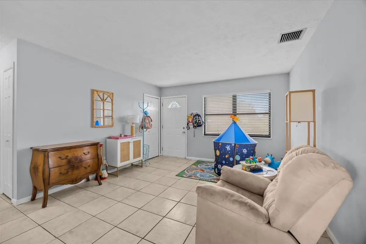 entry living area at 2417 SW RONEY Road, Port St. Lucie
