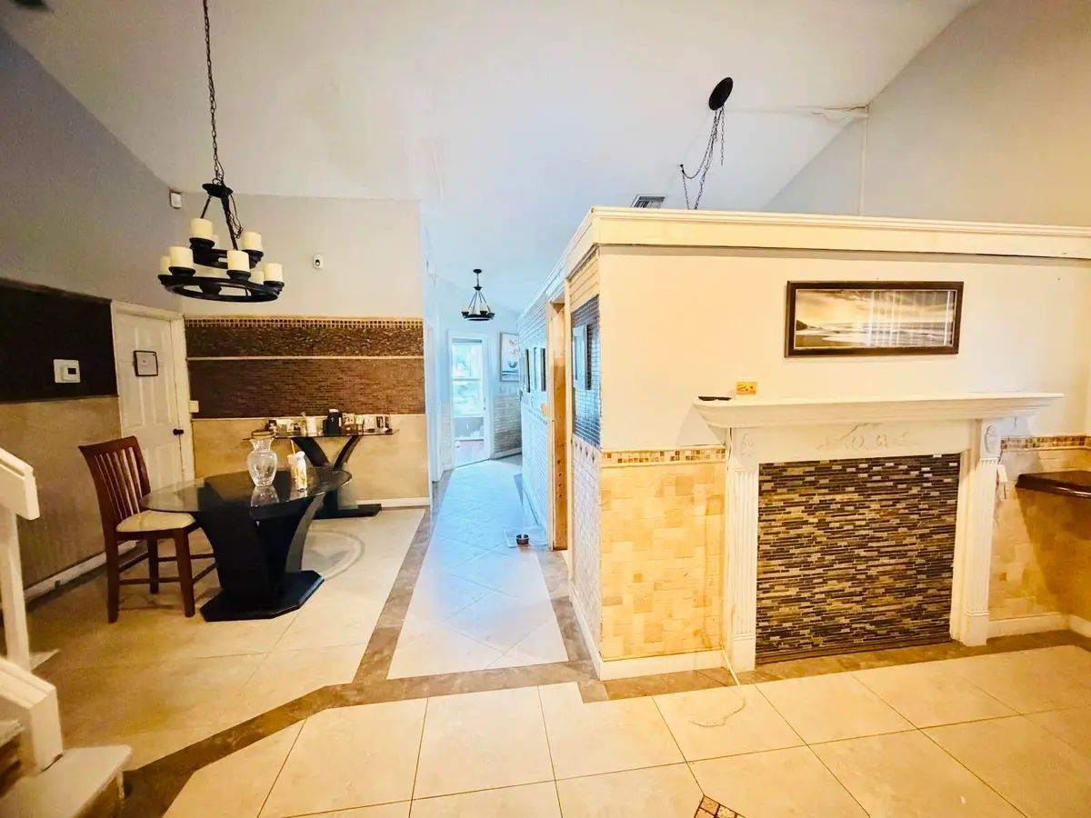 Dining Room/Family room at 106 Azalea Circle, Boynton Beach
