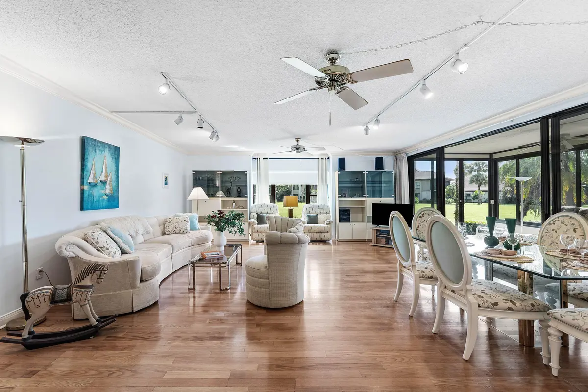 Living room and dining room at 13244 Polo Club Road C107, Wellington