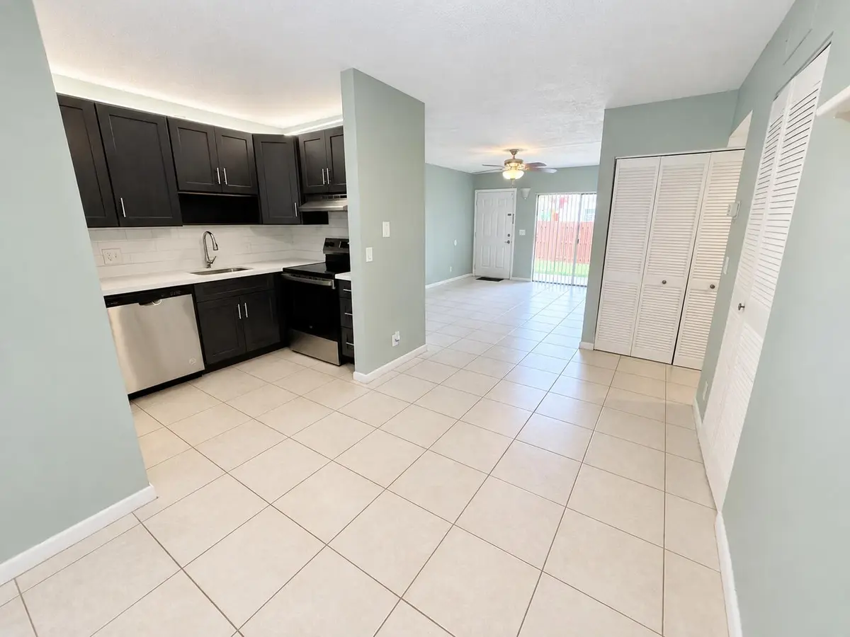 Kitchen/ Living Room Dining Room View at 3253 NW 104th Avenue, Coral Springs