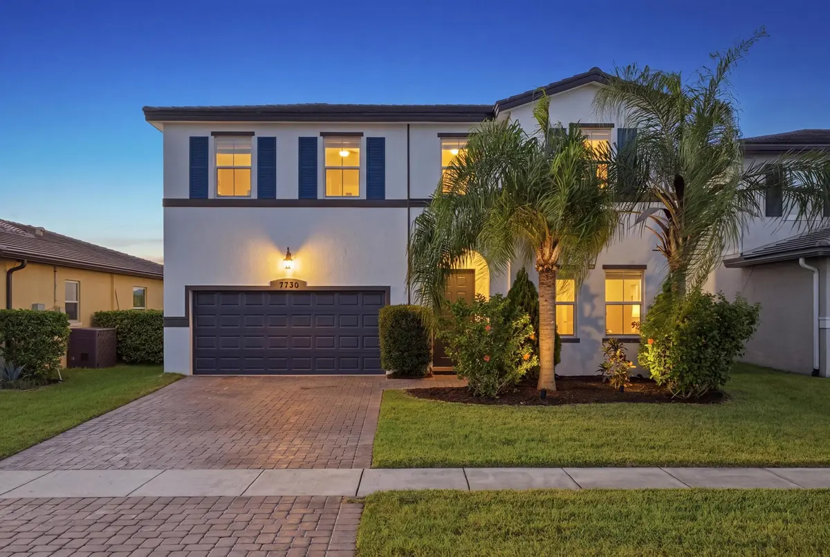 Front twilight at 7730 NW GLADWELL Lane, Port St. Lucie