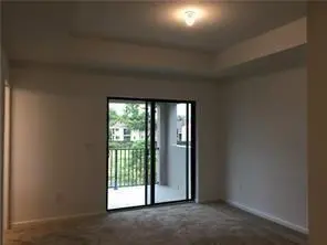 Master Bedroom with Balcony at 335 NW 33RD Lane, Pompano Beach