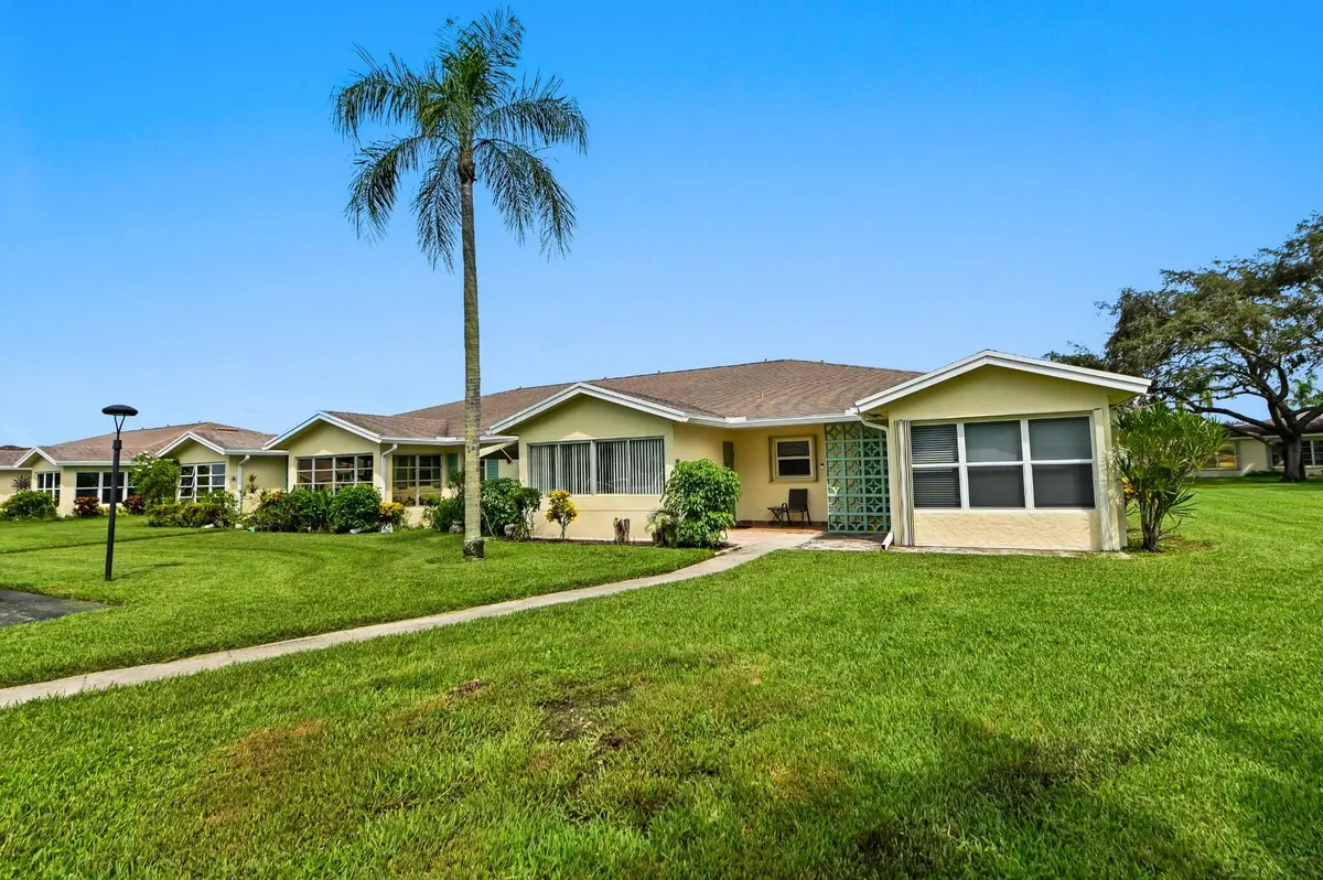 01-Front_Exterior at 5265 Lakefront Boulevard C, Delray Beach