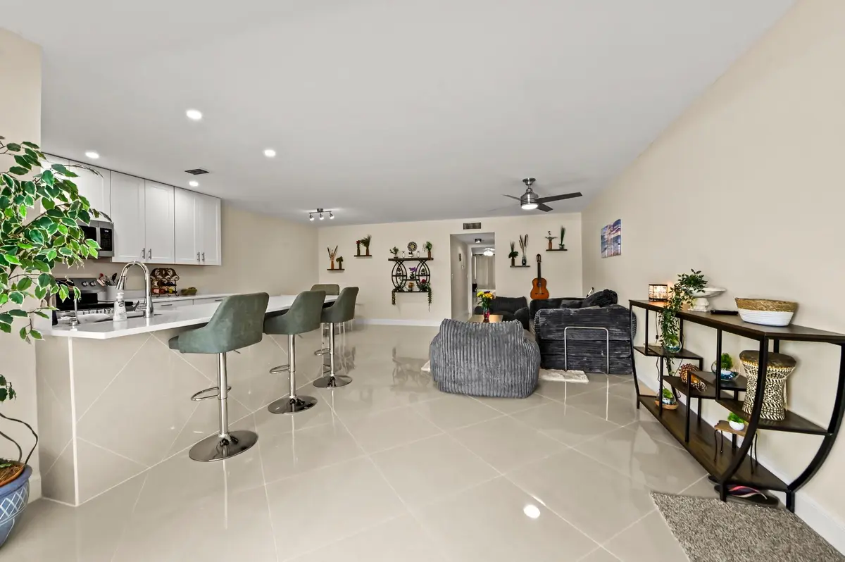 05-Open_Living_Kitchen at 5265 Lakefront Boulevard C, Delray Beach