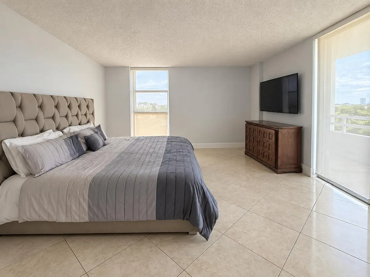 Bedroom- virtual cleaned up at 20355 NE 34 Court 828, Aventura