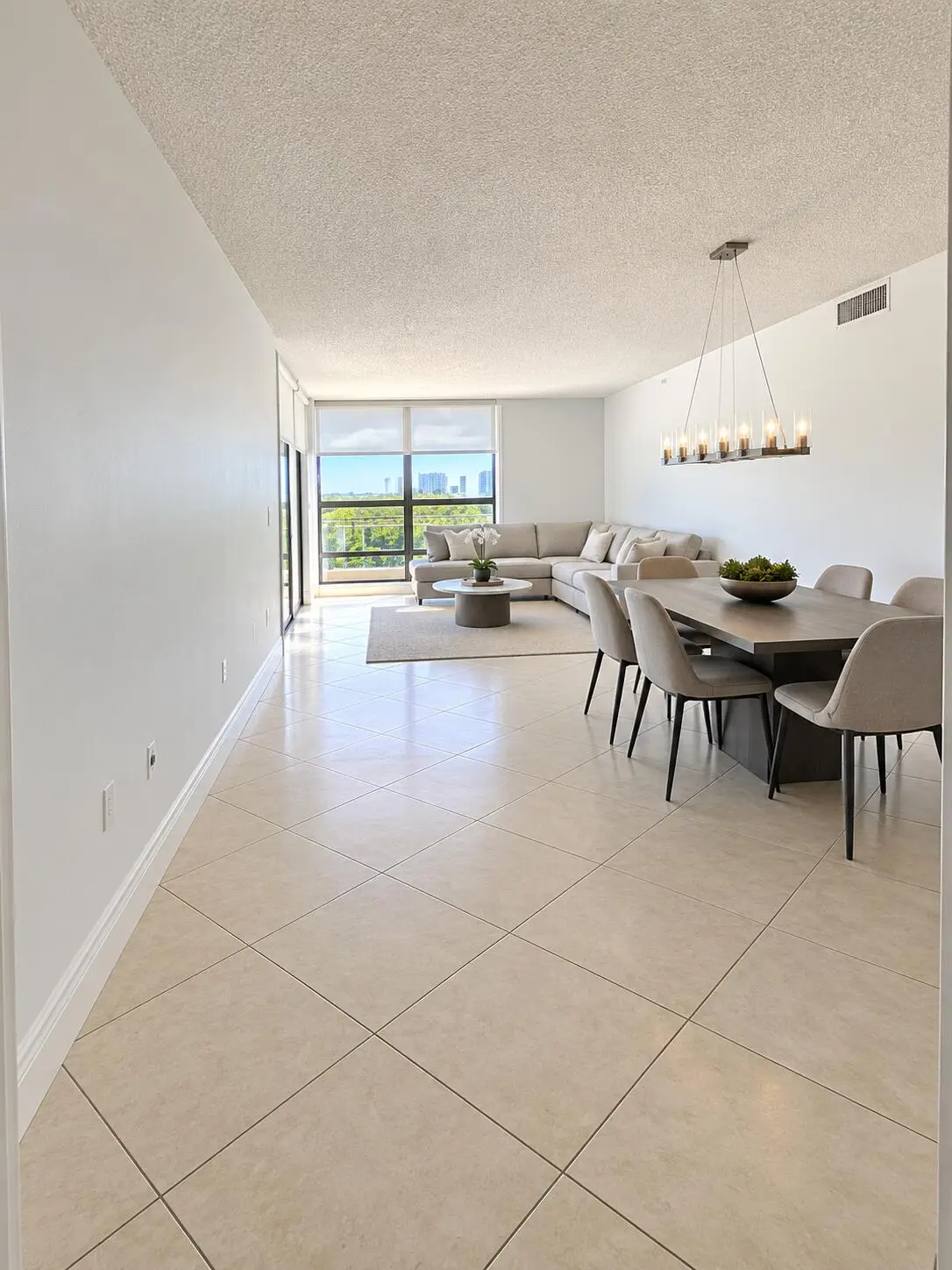 living room Virtually leared at 20355 NE 34 Court 828, Aventura