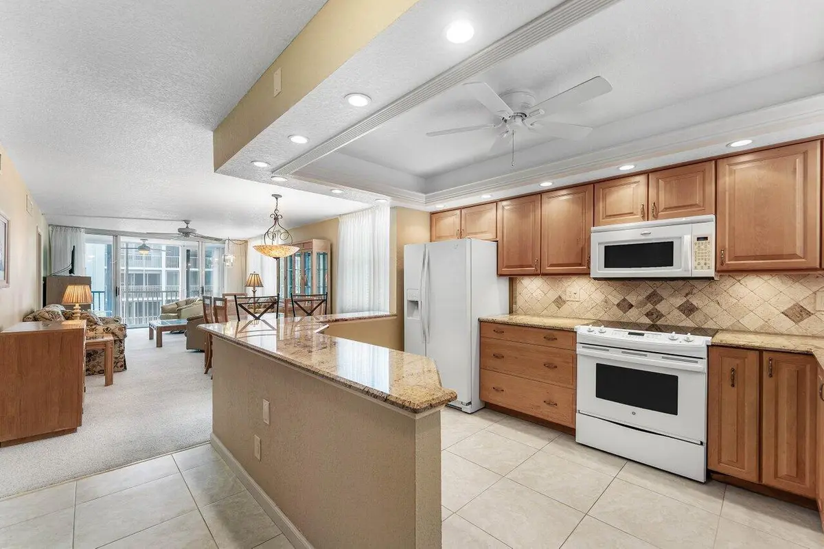 4_Kitchen_into_diningliving_area at 2004 S Federal Highway 309, Boynton Beach