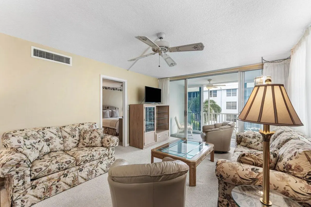 8_Living_area_into_primary_bedroom at 2004 S Federal Highway 309, Boynton Beach