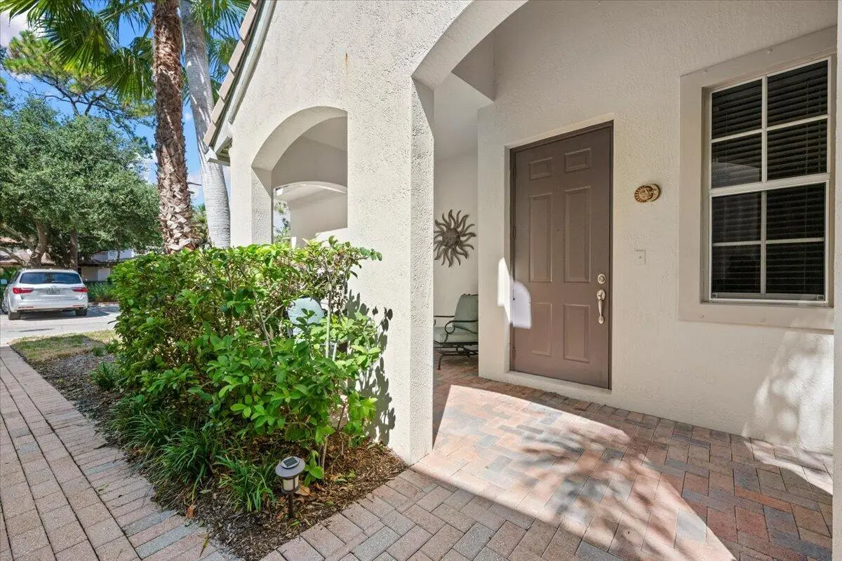 Inviting Porch Entry at 209 Evergrene Parkway, Palm Beach Gardens