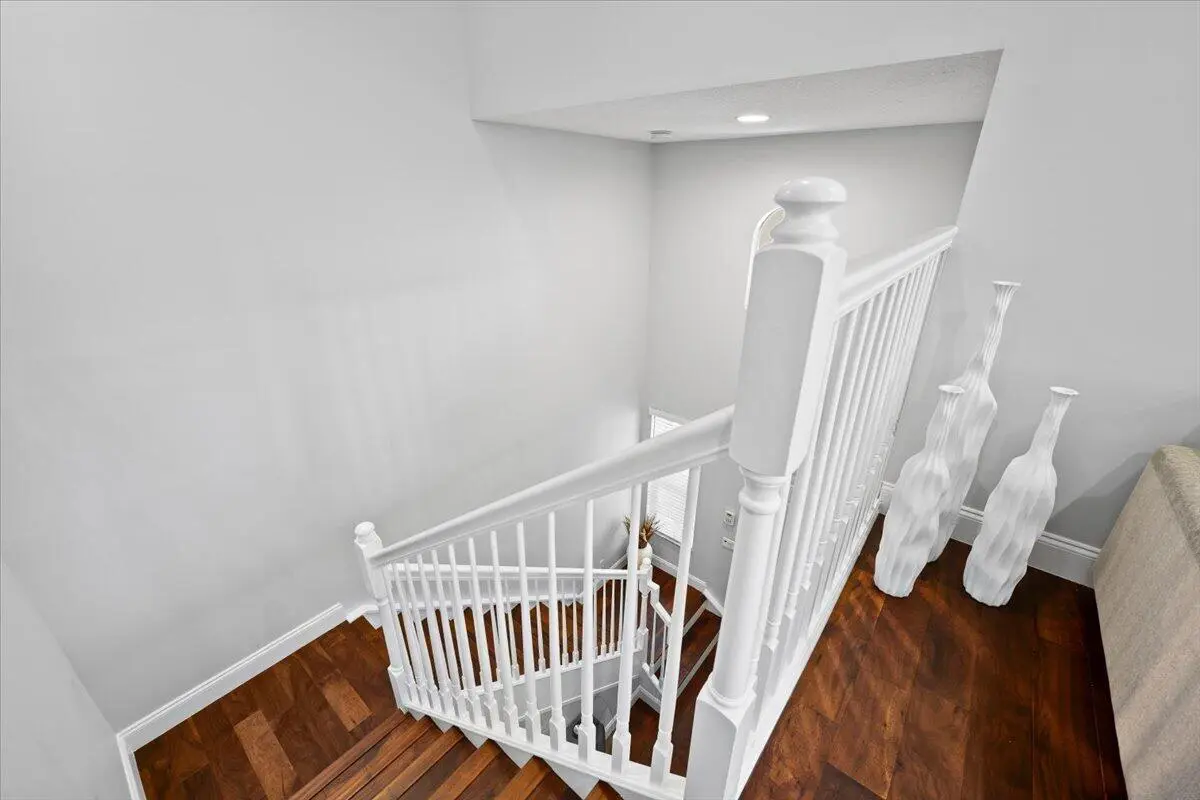Staircase to Living Area at 209 Evergrene Parkway, Palm Beach Gardens