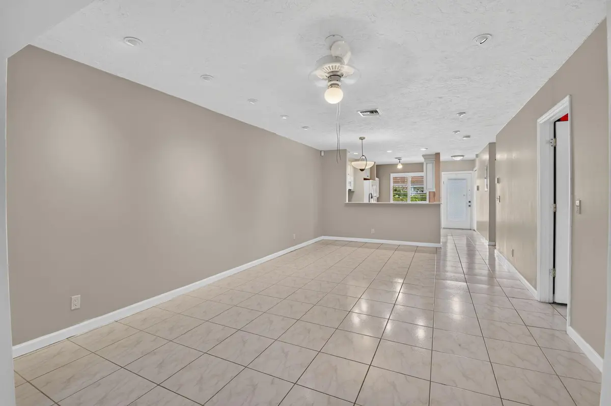 Living room facing front at 6789 MOONLIT Drive, Delray Beach