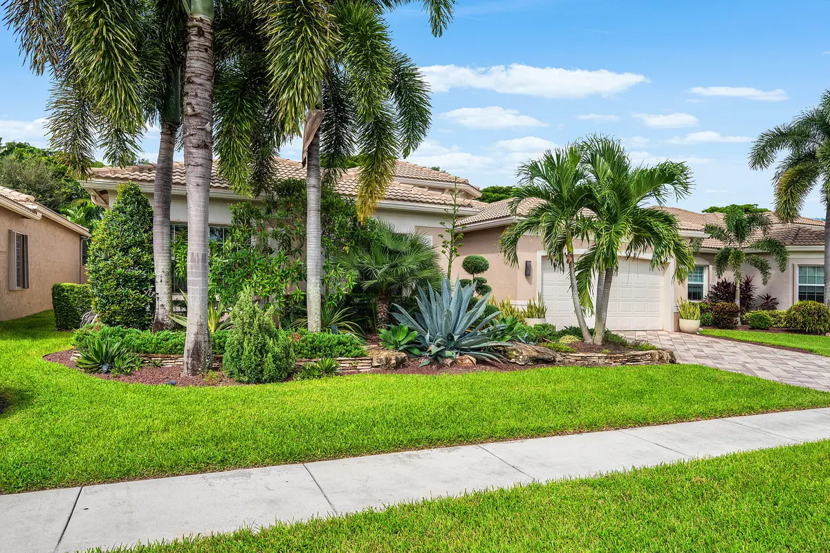 Lushly Landscaped Exterior at 9746 Dovetree Isle Drive, Boynton Beach