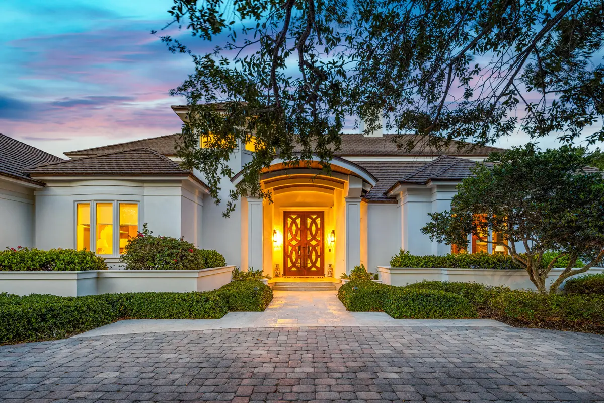 Front Exterior Twilight at 17965 SE VILLAGE Circle, Tequesta