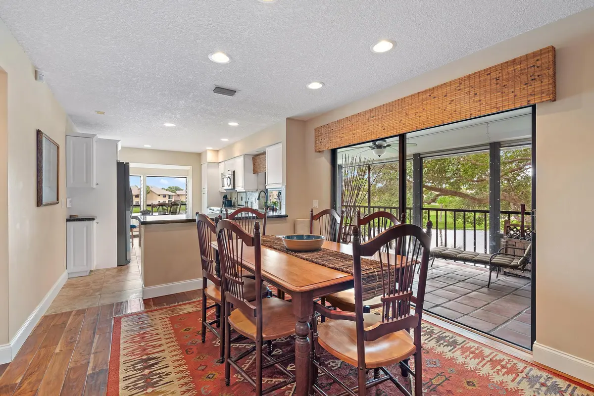 Dinning Area w/ water views at 3881 Back Bay Drive 220, Jupiter