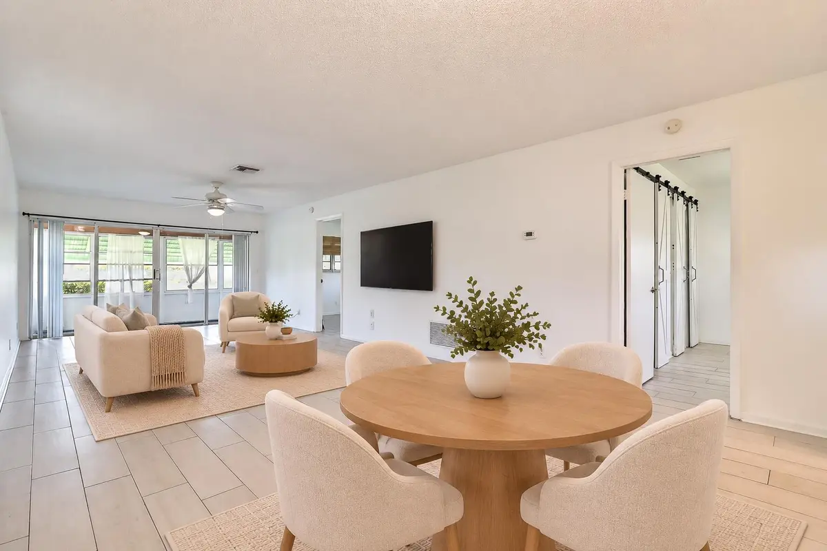 Dining Area Virtually Staged at 450 BLUEBIRD Lane, Delray Beach