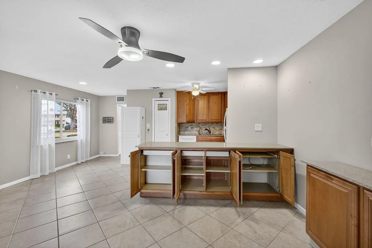 Living Room & Kitchen Island at 221 COVENTRY J, West Palm Beach