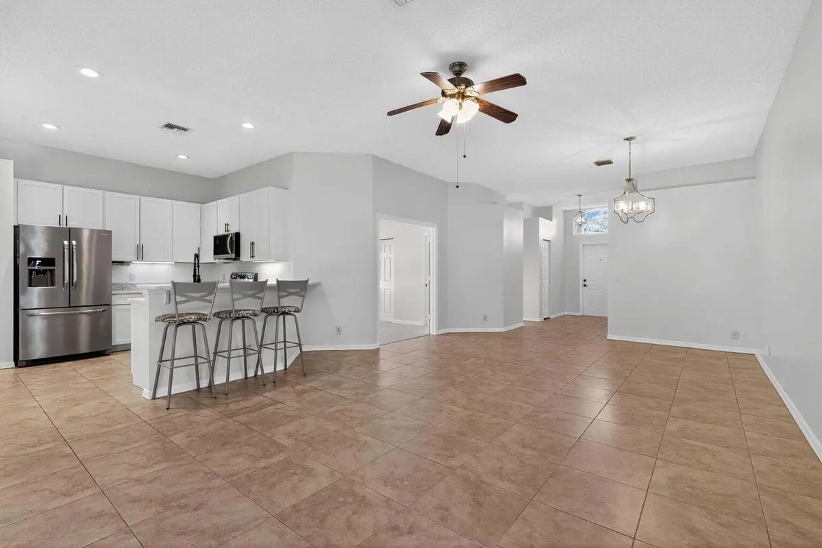 7280 SE Magellan great room:kitchen at 7280 SE MAGELLAN Lane, Stuart