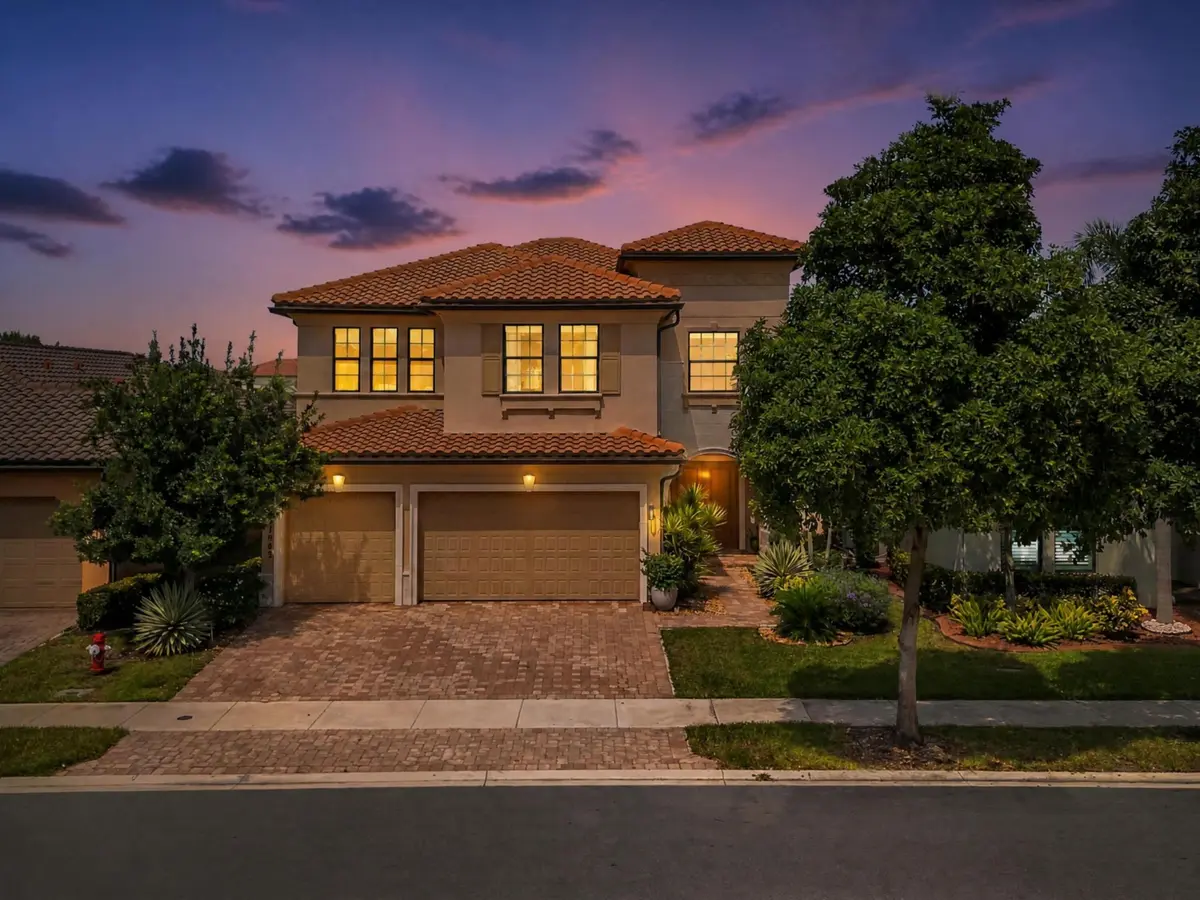 Twilight house photo at 11965 S BAYPOINT Circle, Parkland