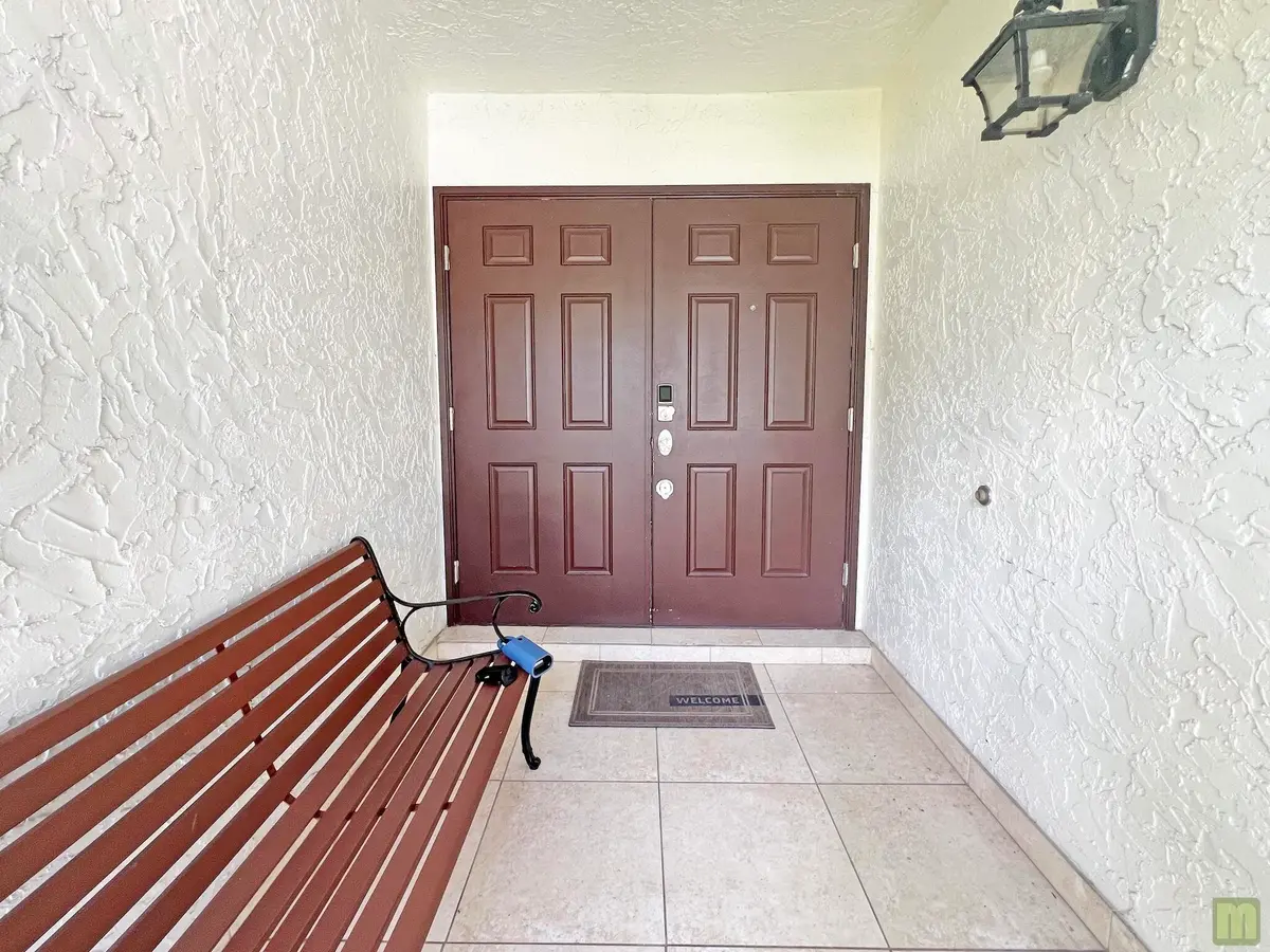 04 front entry at 4975 NW 6TH Street, Coconut Creek