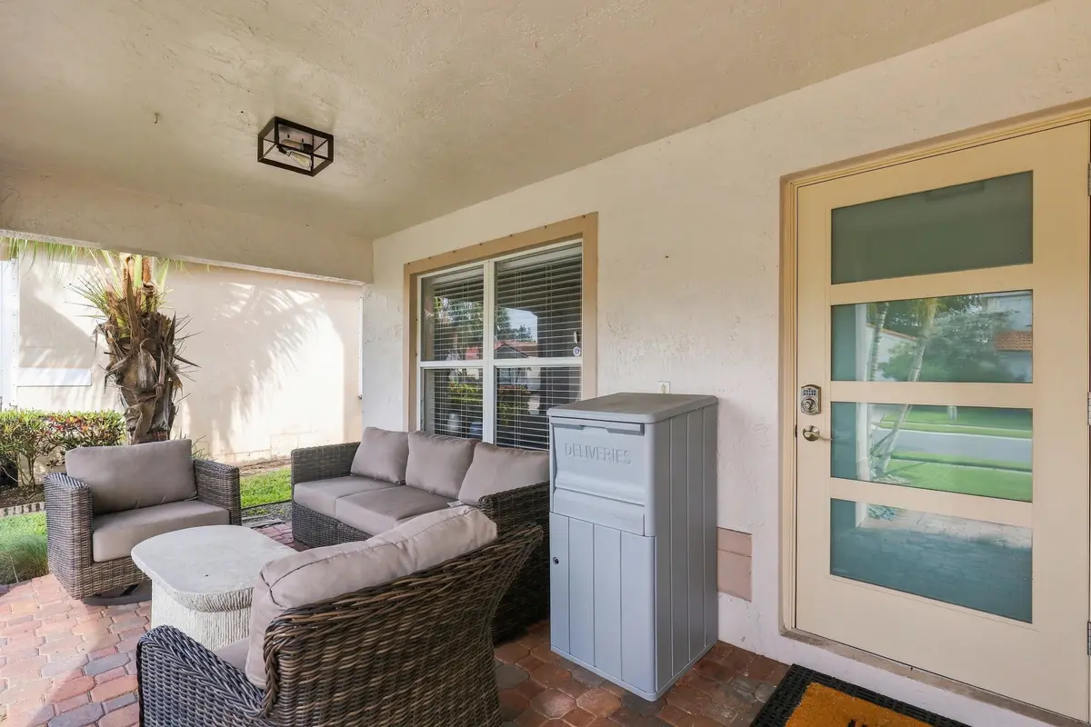 Front Porch W/ Sitting Area at 1434 Artimino Lane, Boynton Beach