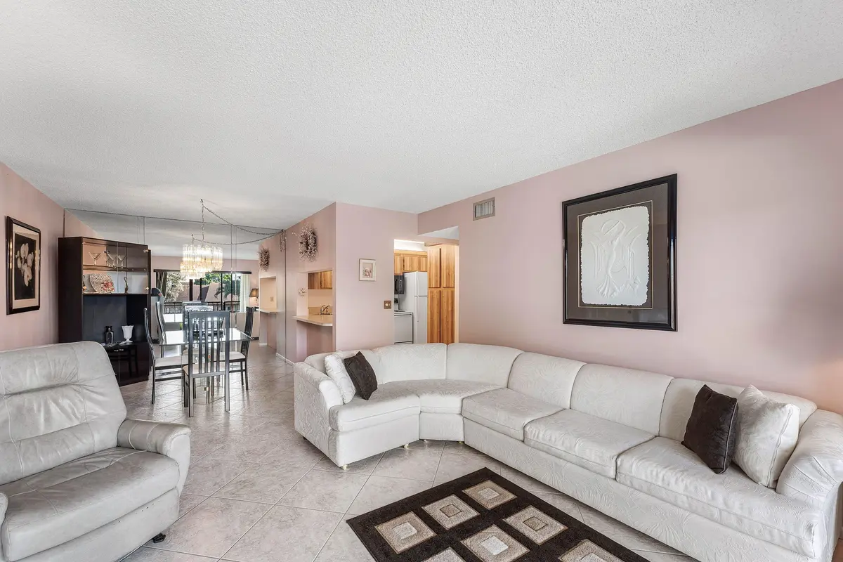 Living/Dining Room at 708 Sunny Pine Way H2, Greenacres