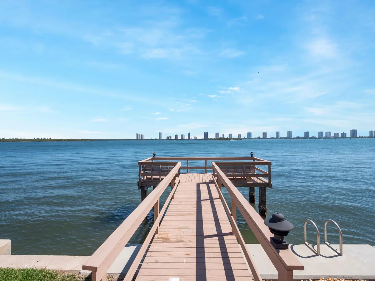 Pier facing east off Intracoastal at 101 Doolen Court 205, North Palm Beach