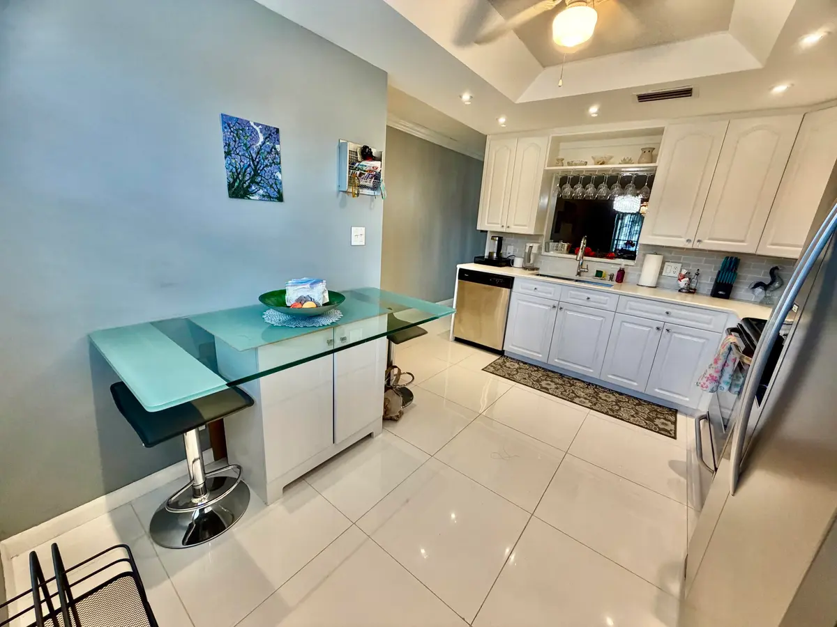 WELL-LIT KITCHEN SPACE at 4401 MARTINIQUE Court H2, Coconut Creek