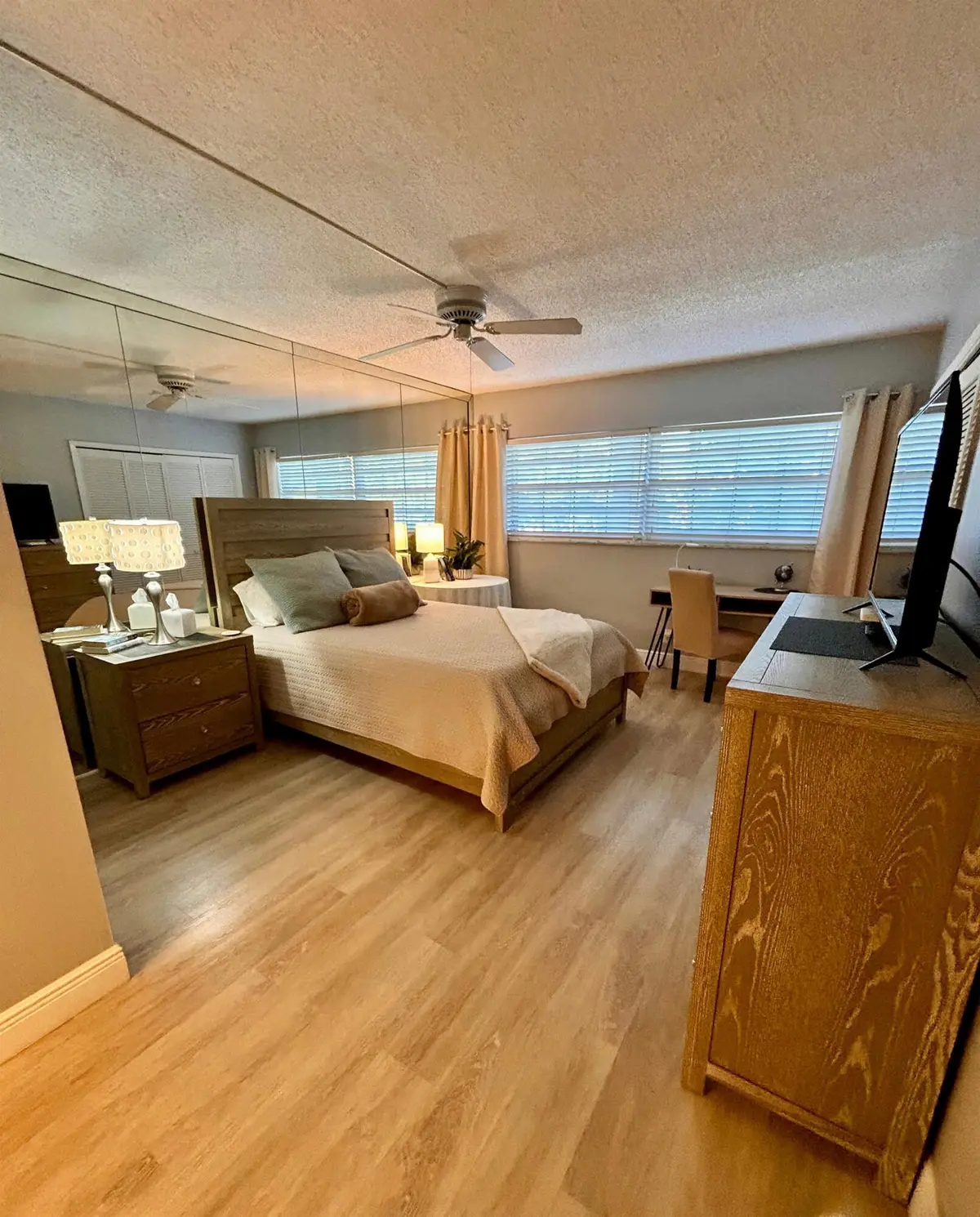 Primary Bedroom with ceiling fan at 3850 OAKS CLUBHOUSE Drive 305, Pompano Beach