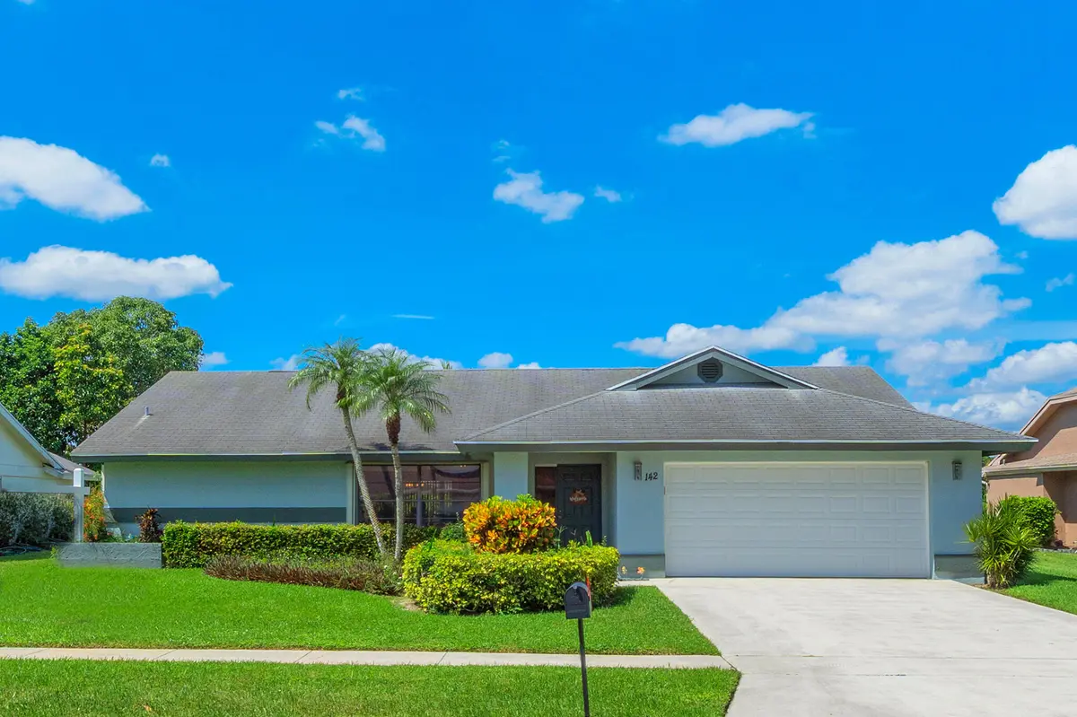 1 Exterior Front (2) at 142 PARKWOOD Drive, Royal Palm Beach