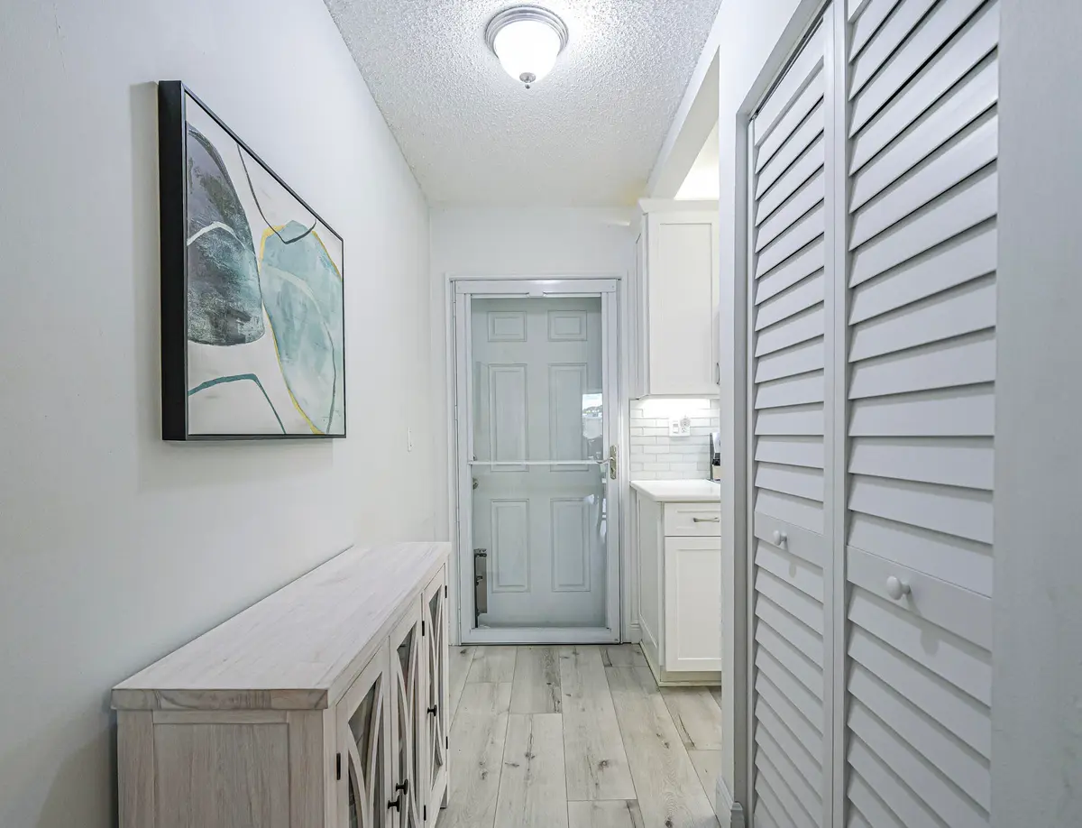 Entry Hallway at 1975 SW Palm City Road 39 J, Stuart