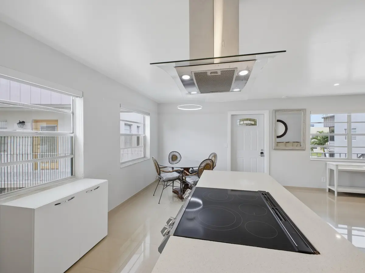 Kitchen to Dining at 471 Capri J, Delray Beach