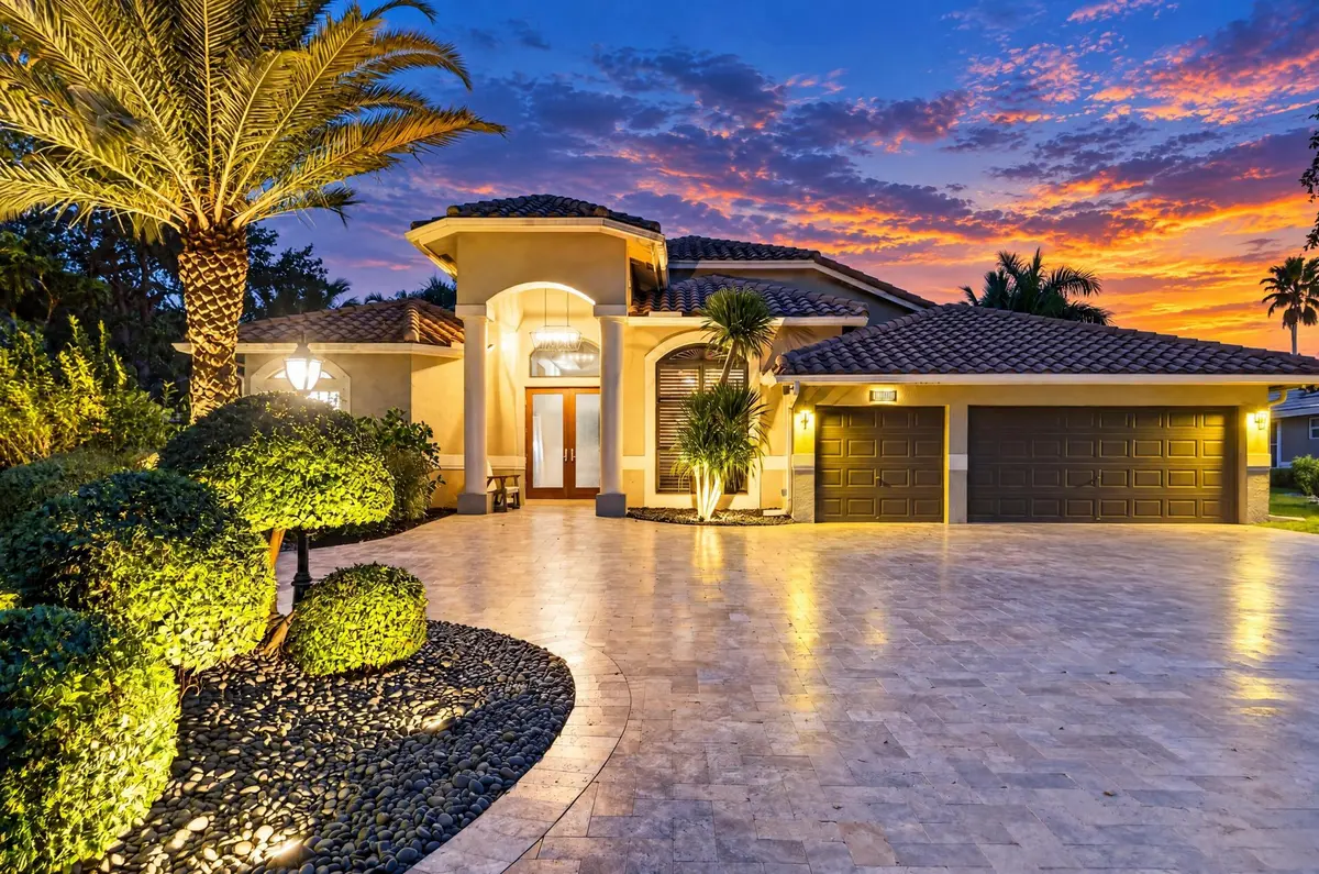 001-030-Front of Home-4000x2650 at 10090 NW 59th Drive, Parkland