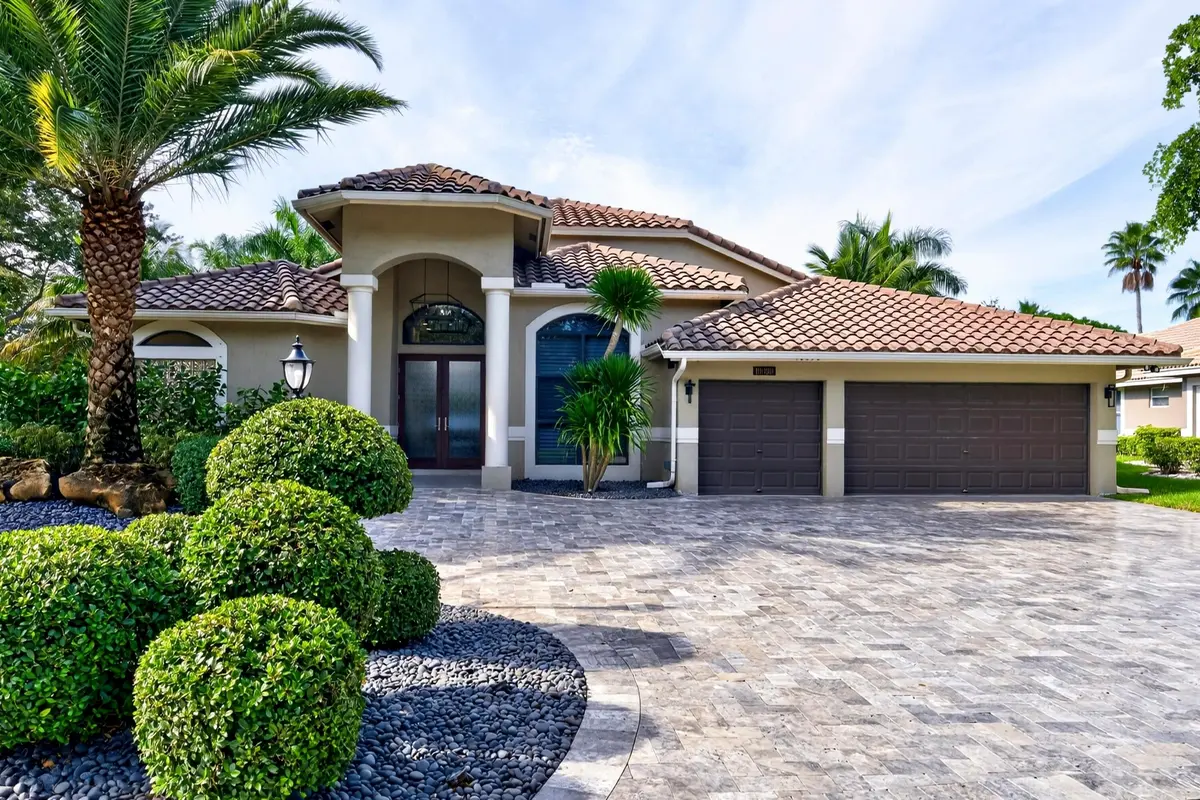 005-006-Front of Home-4000x2666 at 10090 NW 59th Drive, Parkland